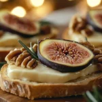 Pecan & Fig Brie Crostini with Rosemary Honey Drizzle